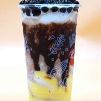 I07. Iced Milk Drink W/ Chocolate, Pudding, & Honey Boba.